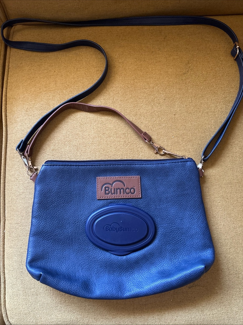 Baby Bumco Vegan Leather Diaper Crossbody/Clutch lightweight baby travel bag.
